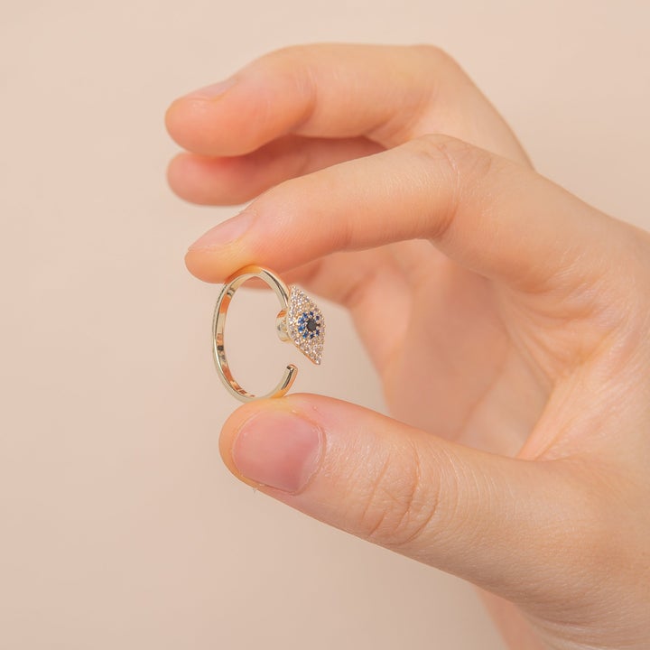 Anillo de ansiedad giratorio de ojo turco