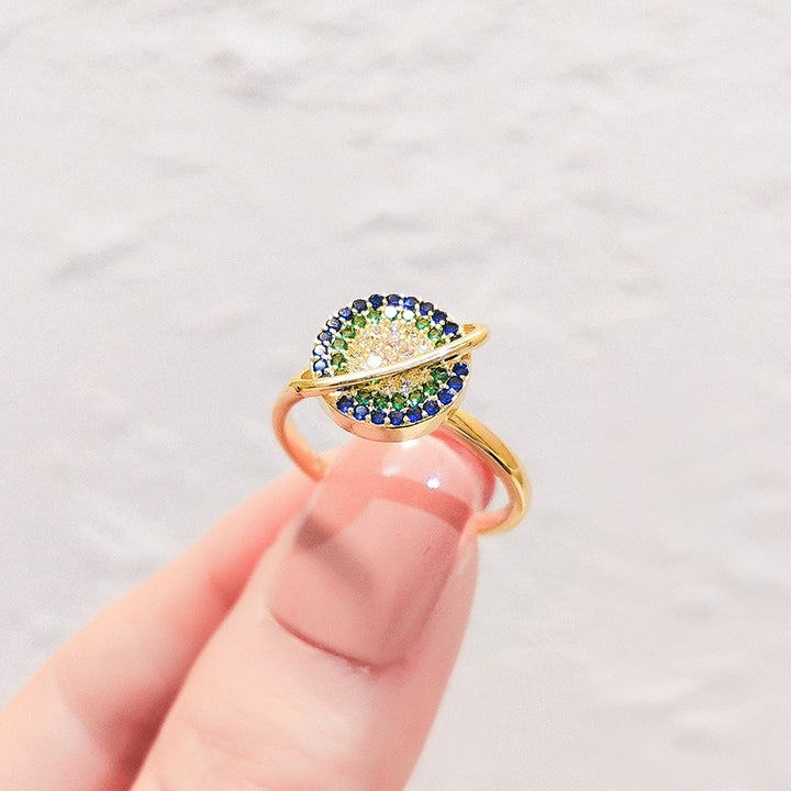 Anillo de ansiedad de planeta giratorio